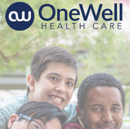 Woman Holding a Tablet Against Blank Wall